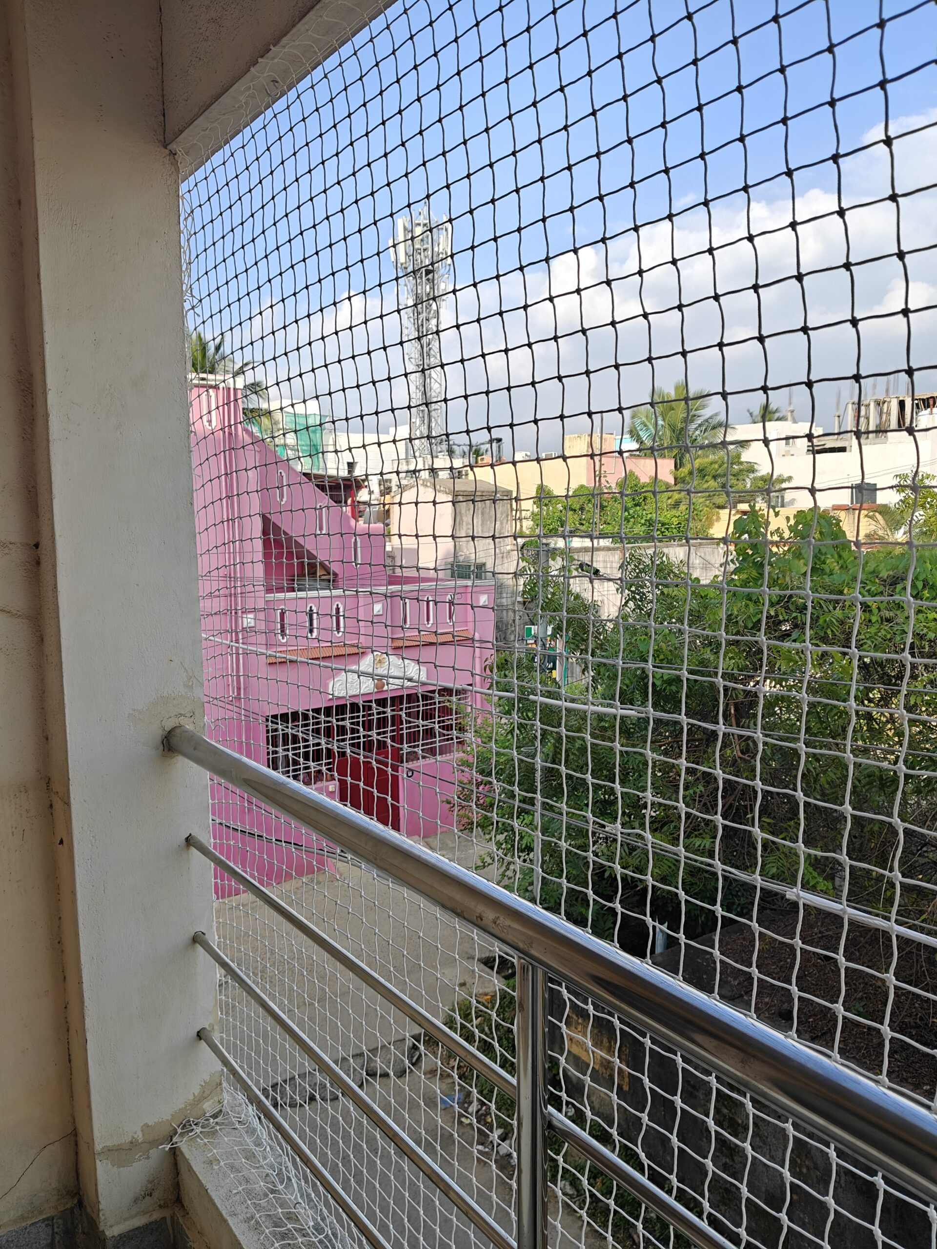 Duct area pigeon nets installation for Ashok Nagar apartments