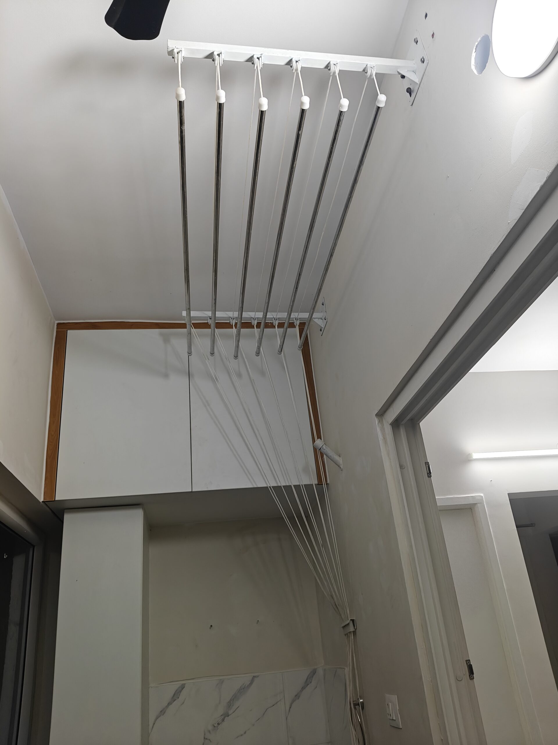 Bathroom cloth hanger installation in Chennai home