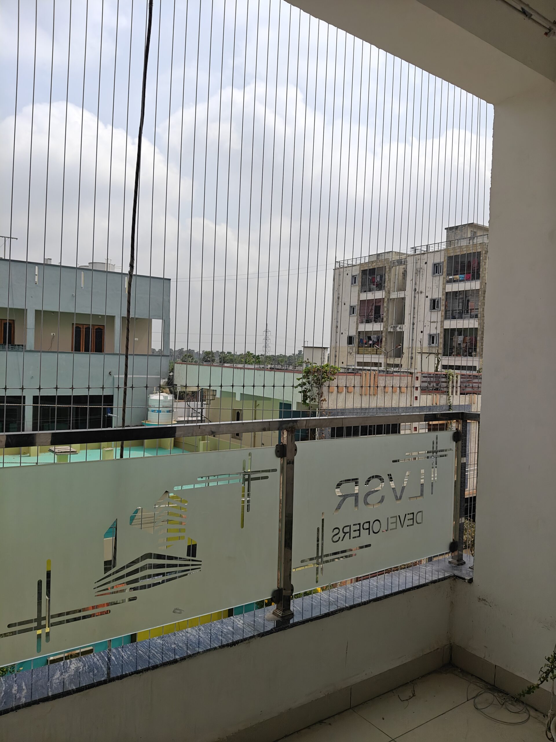 High-rise invisible grills in Chennai apartment building