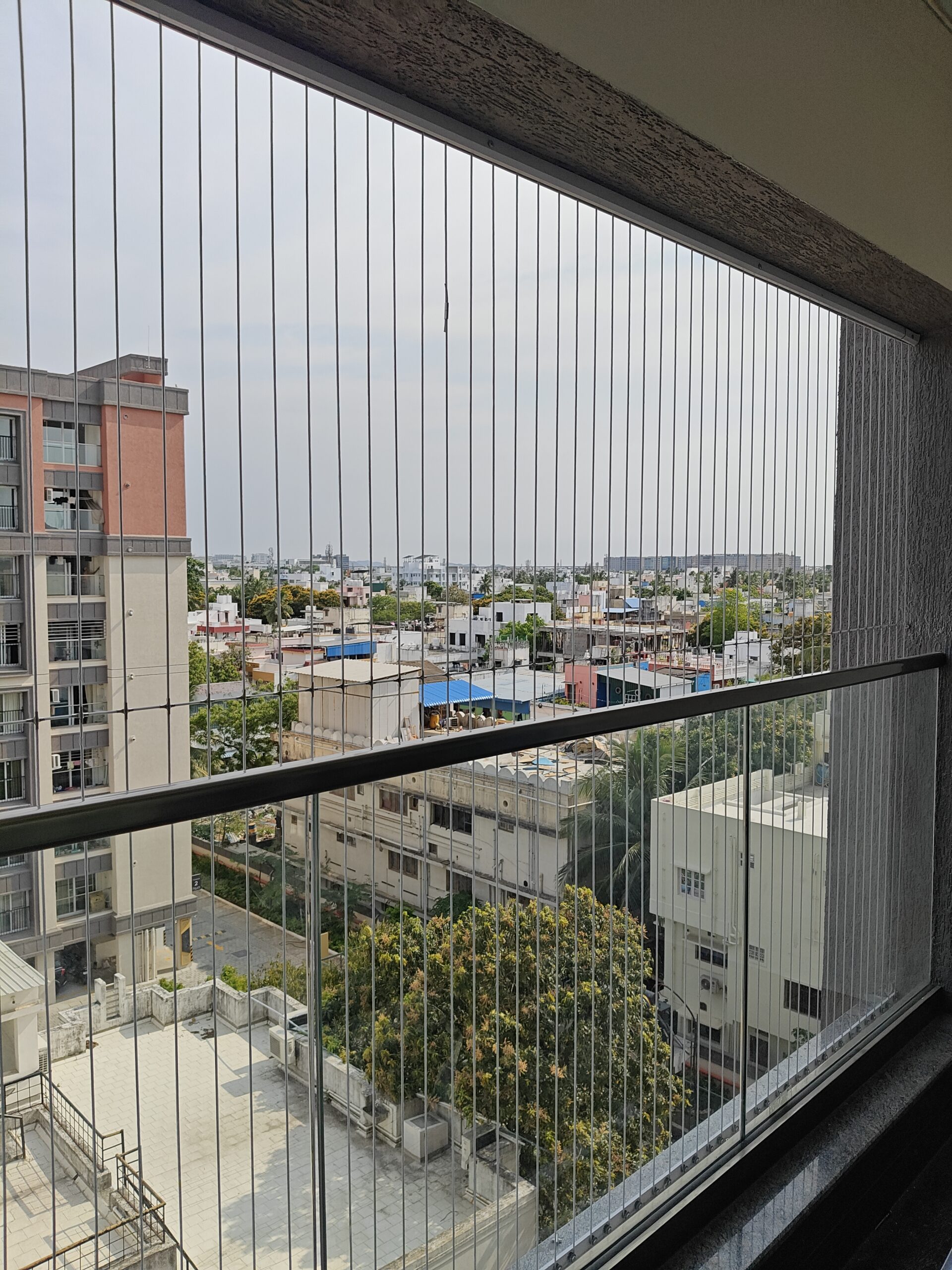 Balcony invisible grills in Chennai apartment
